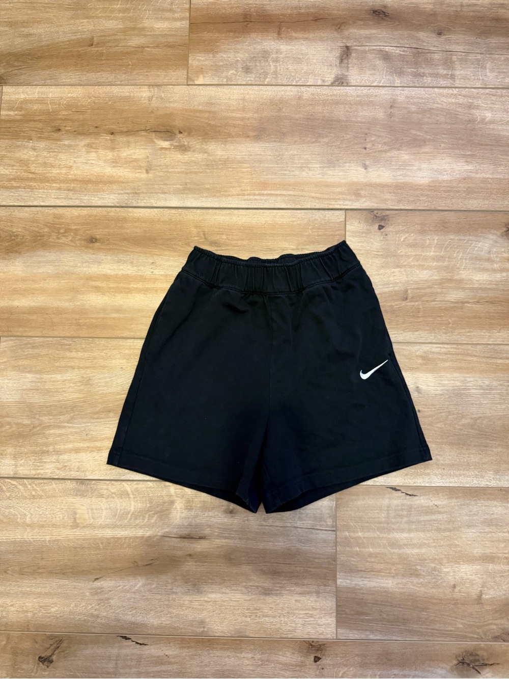 Nike Women's Black Athletic Shorts with White Swoosh Accent